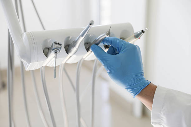 Professional Tooth Extraction technician working in Leland Grove, IL
